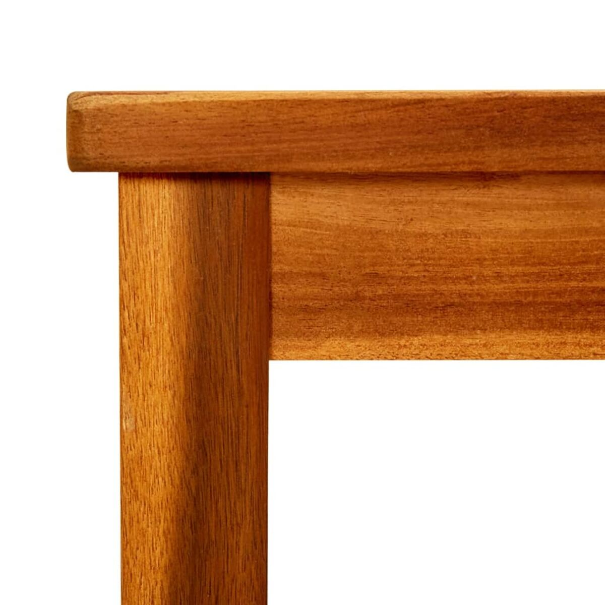 Nahaufnahme einer Holztischecke, die die Tischlerei zeigt. Warmer, natürlicher Holzton.