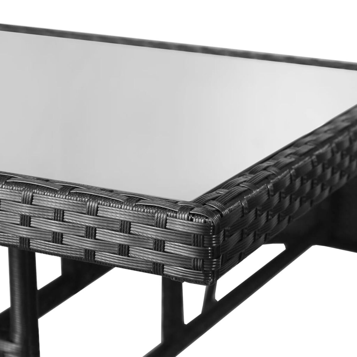 Schwarzer Korbtisch mit Glasplatte, Nahaufnahme der Ecke.