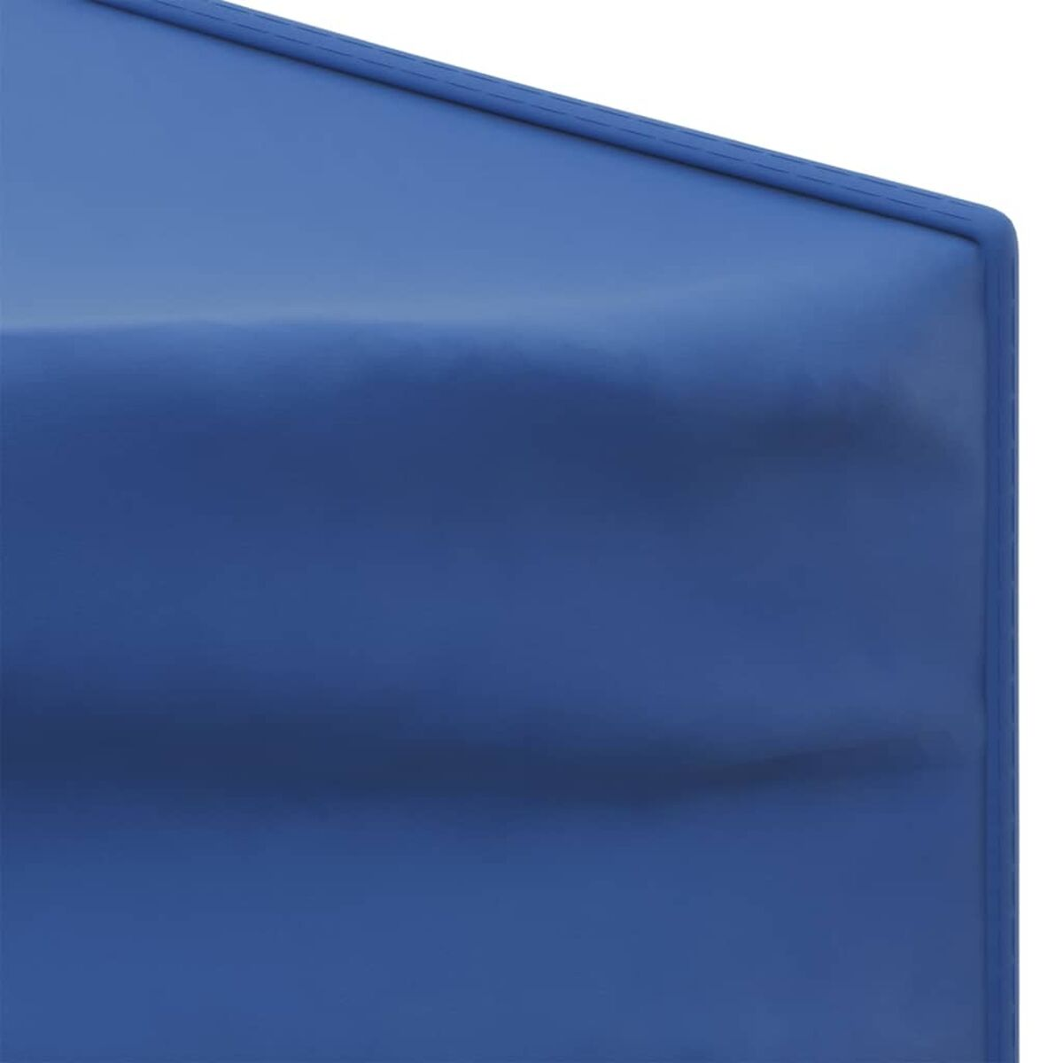 Nahaufnahme einer blauen Oberfläche mit gebogenen Kanten und leichter Textur.