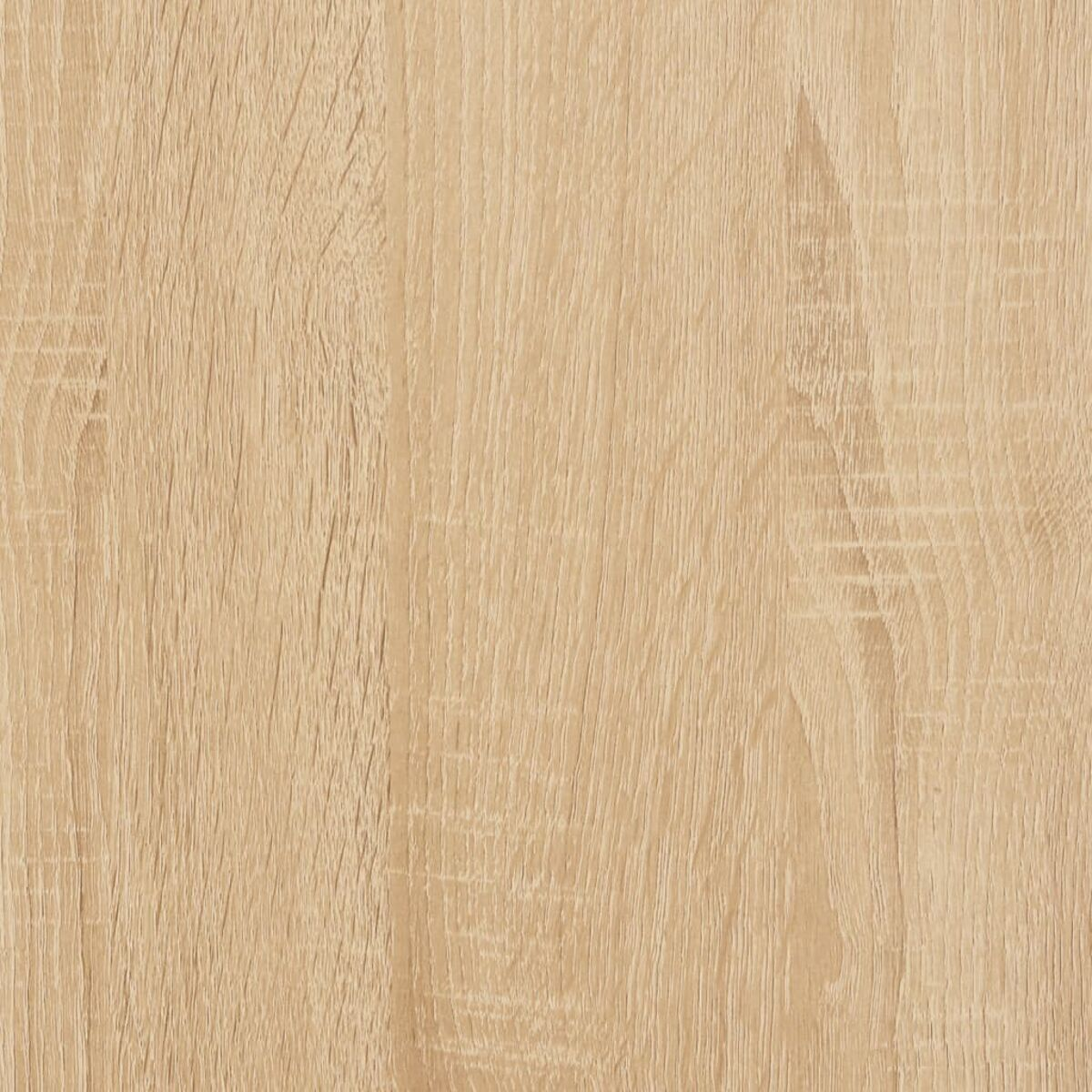 Nahaufnahme einer Holzplatte mit sichtbarer Maserung. Die Platte ist hellbraun.