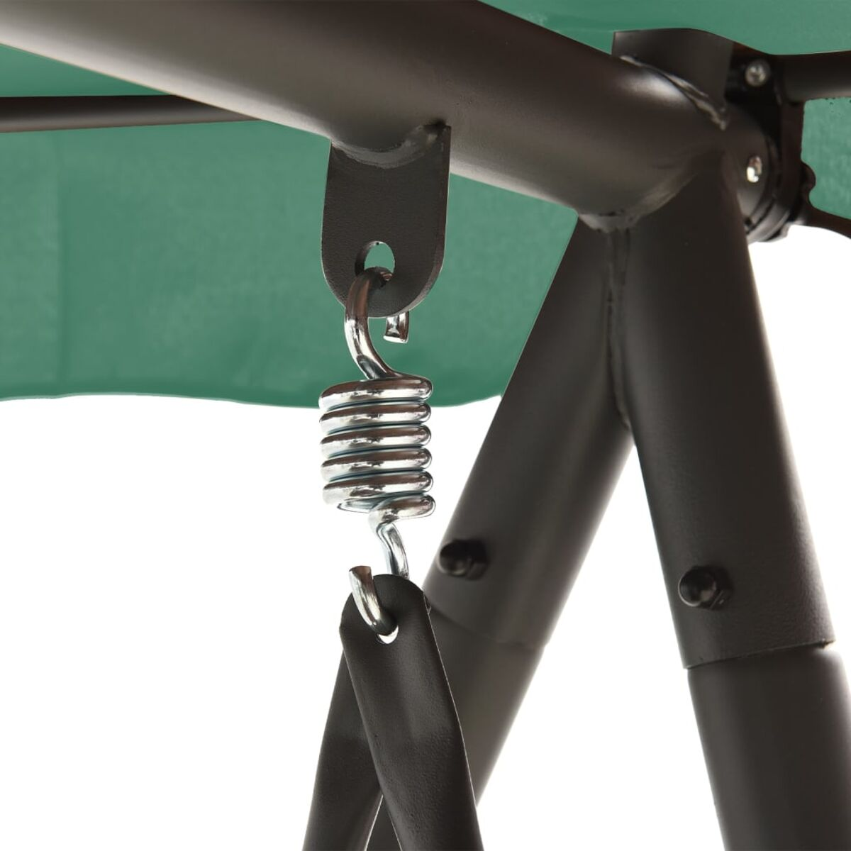 Nahaufnahme der Schaukel-Hardware, einschließlich Feder und grünem Vordach.