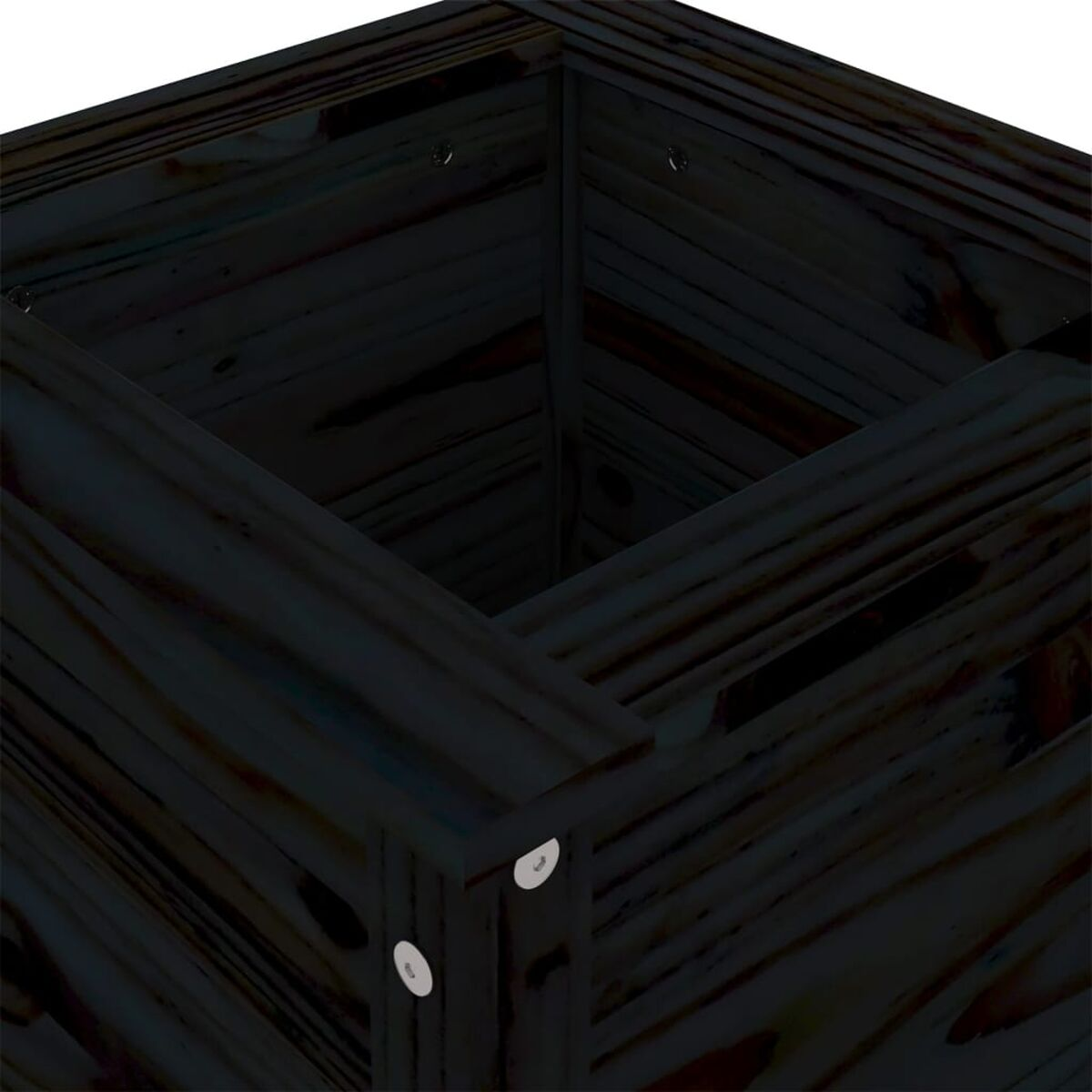 Schwarzer Holzpflanzkasten. Die Box ist dunkel und hat Schrauben. Draufsicht.
