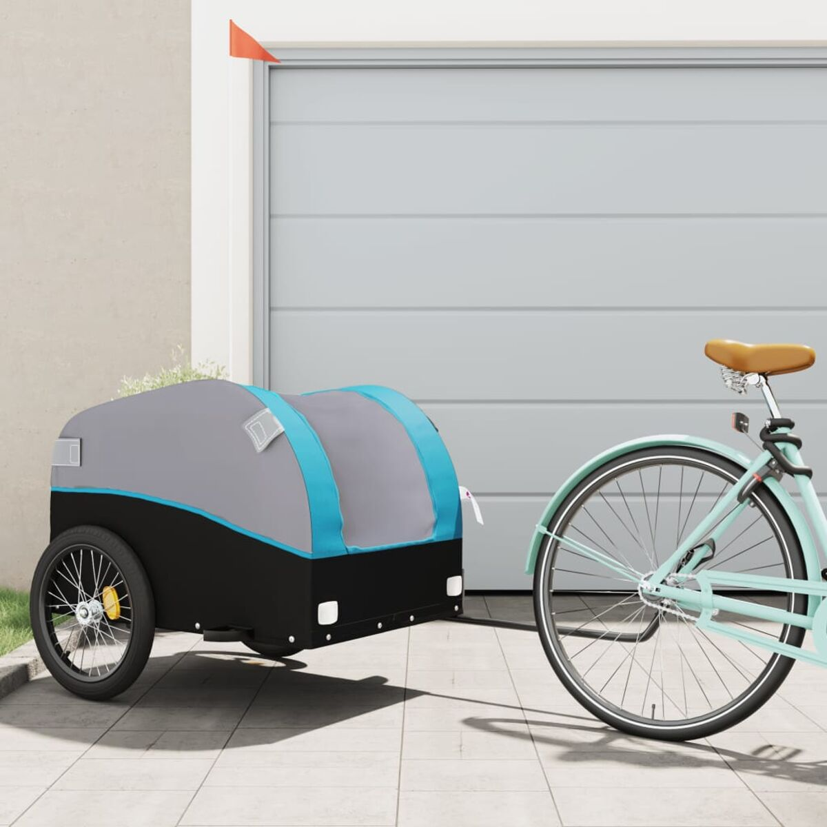 Fahrradanhänger und Fahrrad. Der Anhänger ist grau und schwarz, mit einem hellblauen Streifen. Das Fahrrad ist mintgrün.