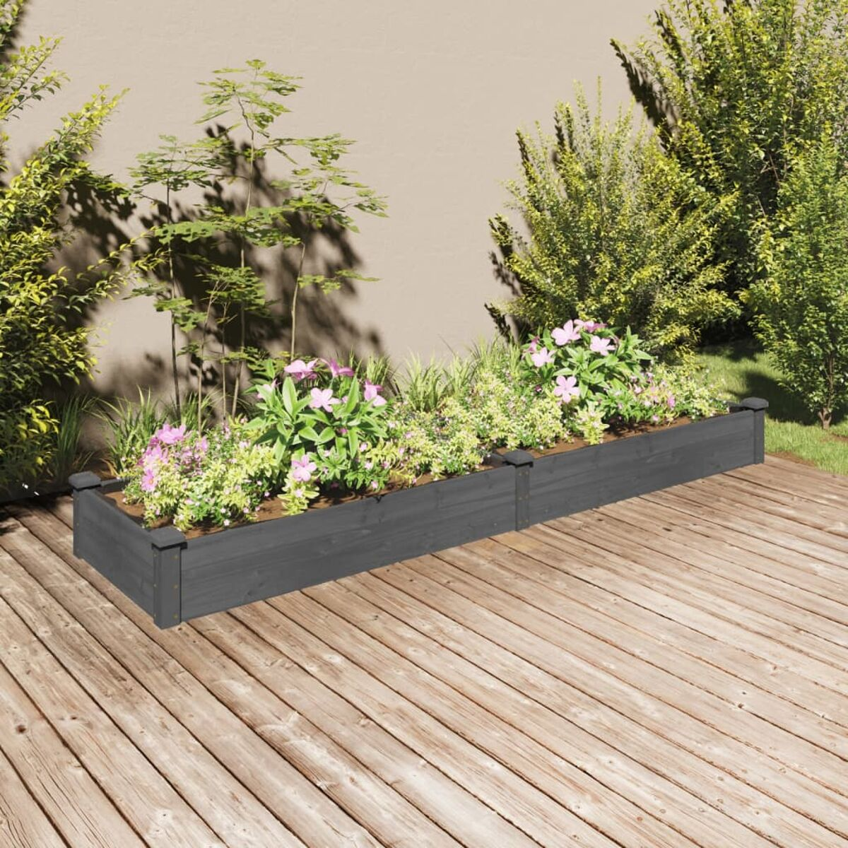 Zwei graue Gartenpflanzkästen mit Blumen.