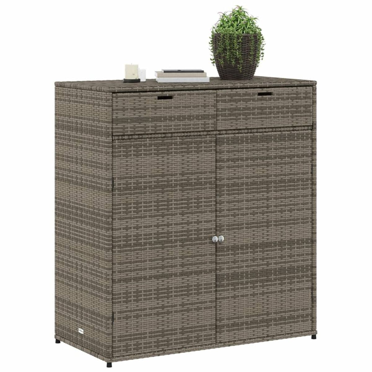 Korbschrank mit Schubladen und Türen, oben mit Pflanze und anderen Objekten.