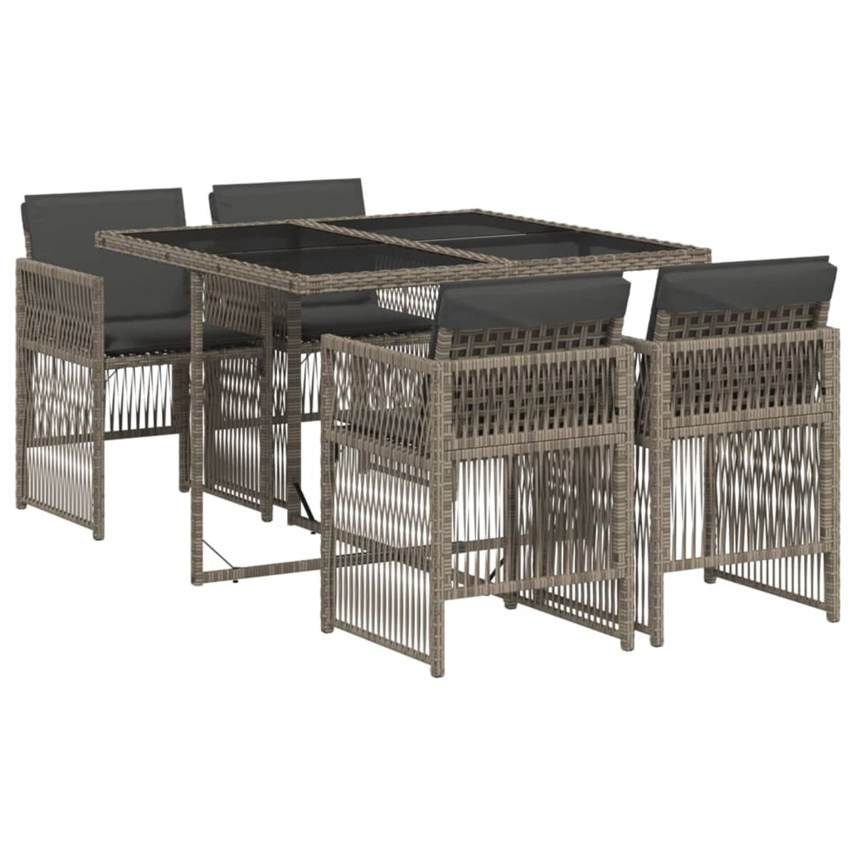 Set tavolo e sedie in vimini. Tavolo con piano in vetro, quattro sedie con cuscini grigi.