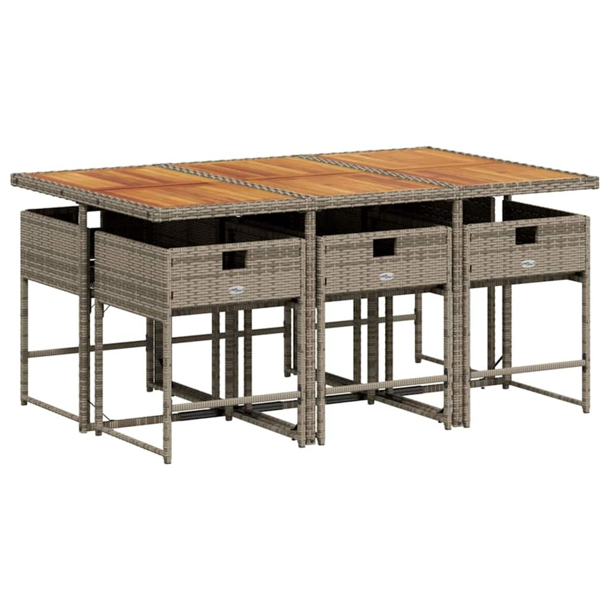 Tavolo da esterno con cassetti in rattan e piano in legno con sedie in rattan. All'aperto.
