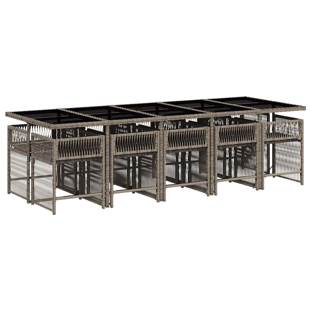 Set da pranzo per esterni con tavolo e sedie in rattan con piano in vetro nero.