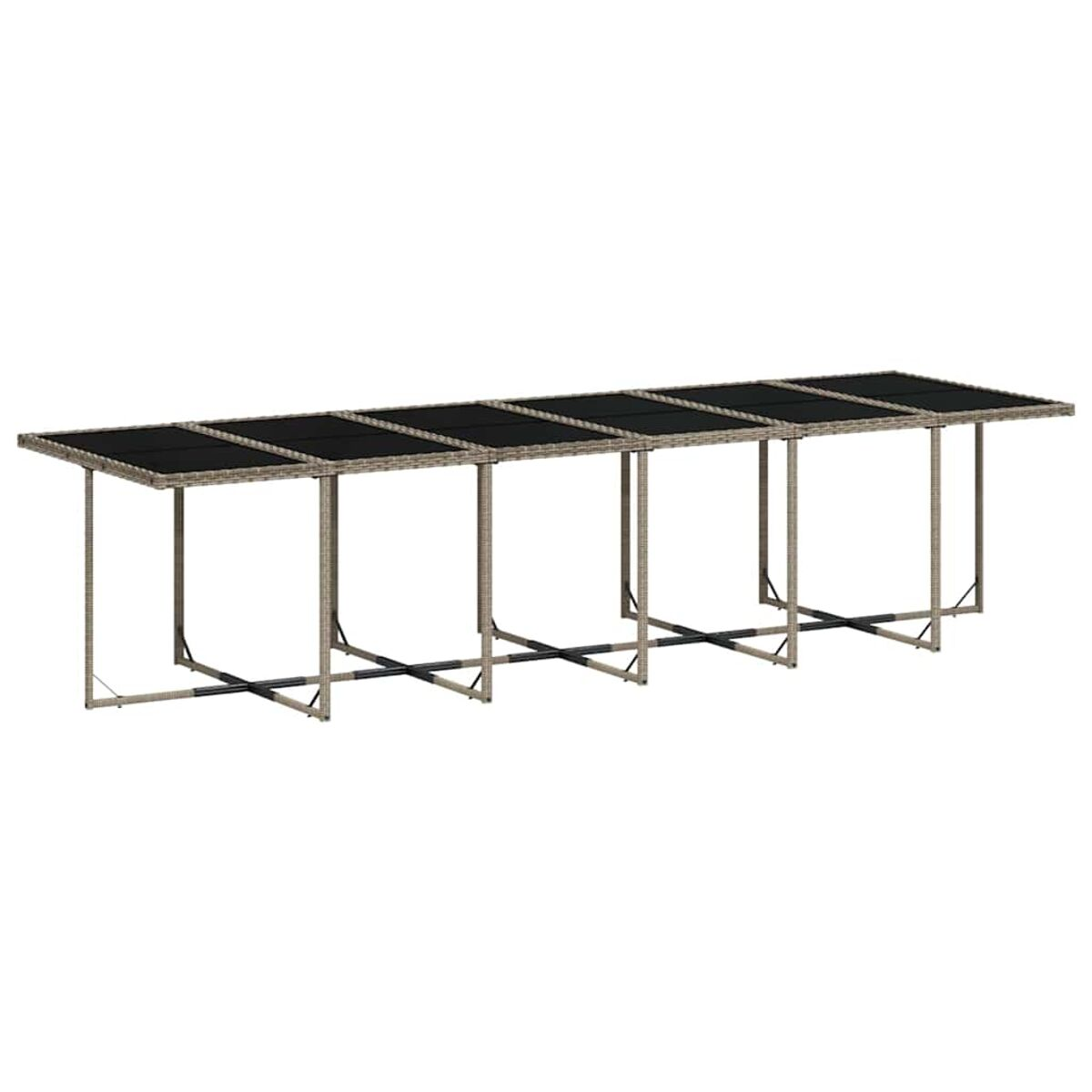 Tavolo da esterno lungo e rettangolare con piano in vetro scuro e gambe marrone chiaro.