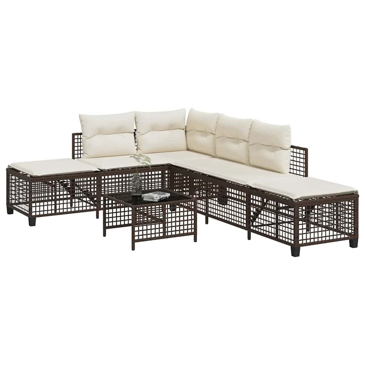 Set divano componibile in vimini marrone con un tavolo su sfondo bianco.