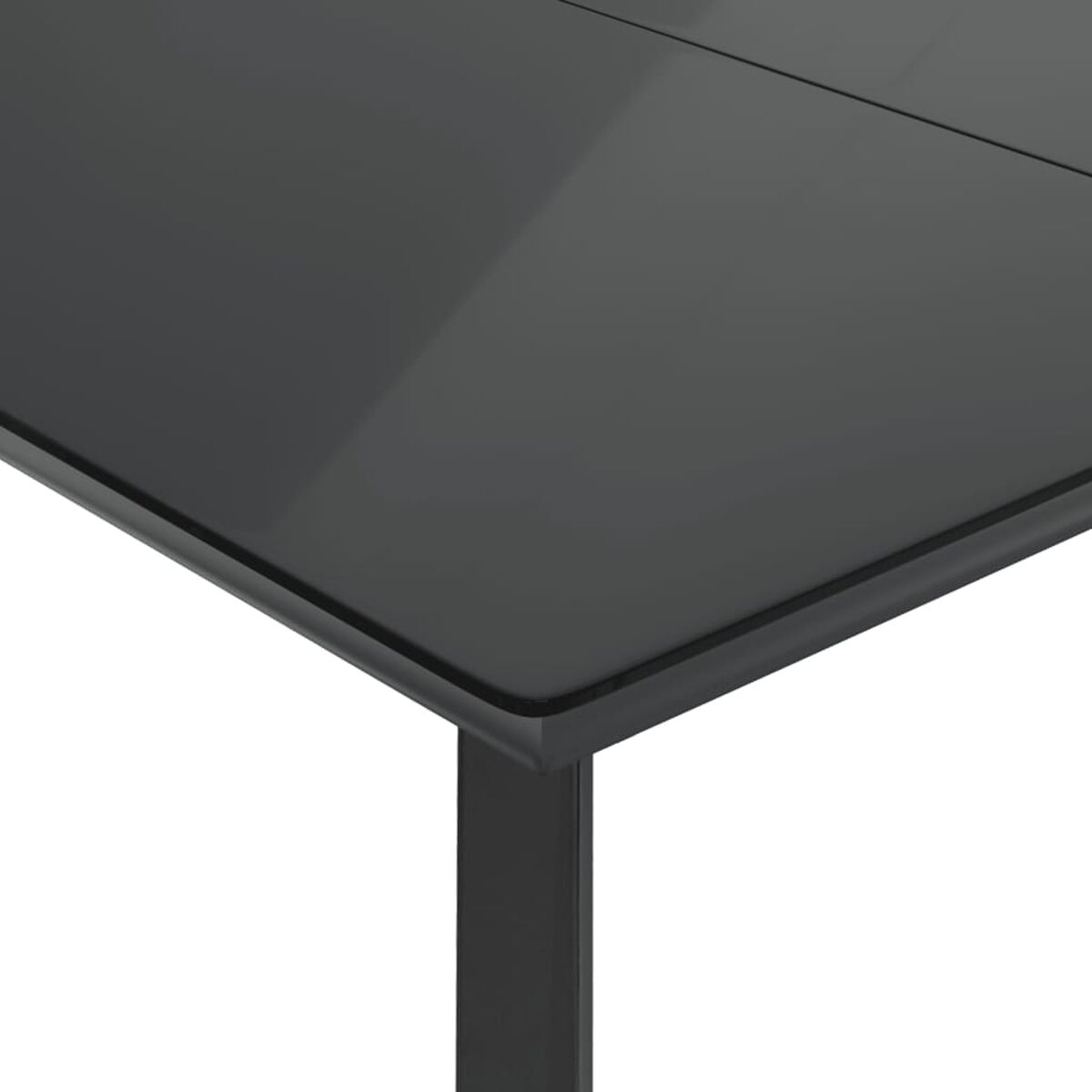 Nahaufnahme einer schwarzen Tischecke mit einem schwarzen Metallbein, die ein schlankes Design zeigt.