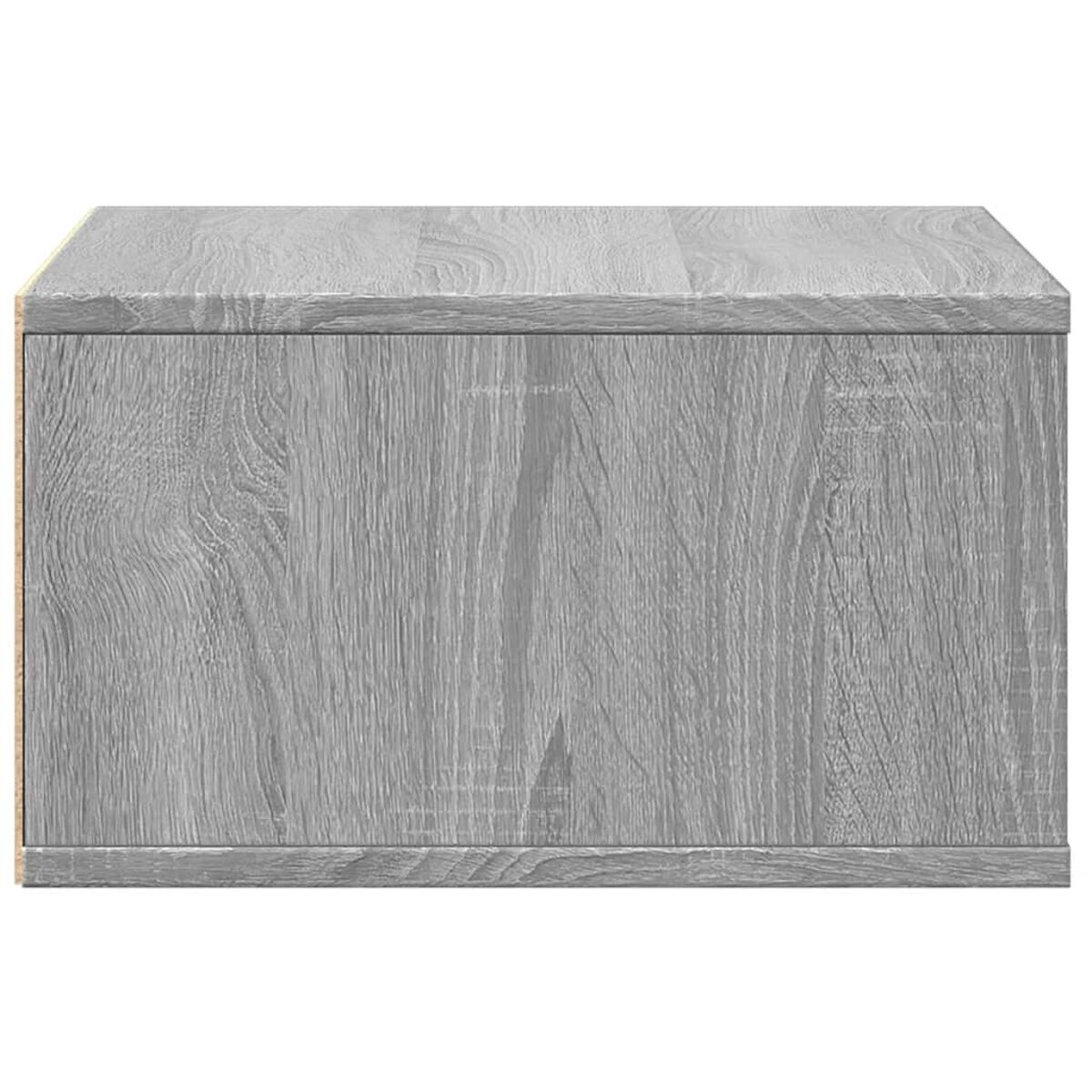 Ein grauer Holzschrank. Der Schrank ist rechteckig mit Holzmaserung.