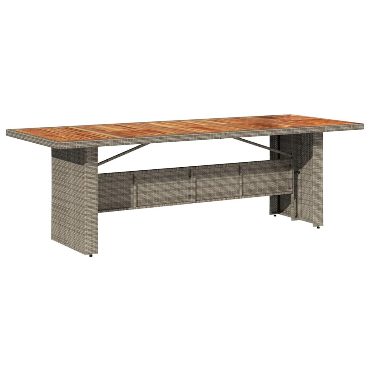 Tavolo rettangolare da esterno con piano in legno e lati in vimini. Il tavolo è marrone chiaro.