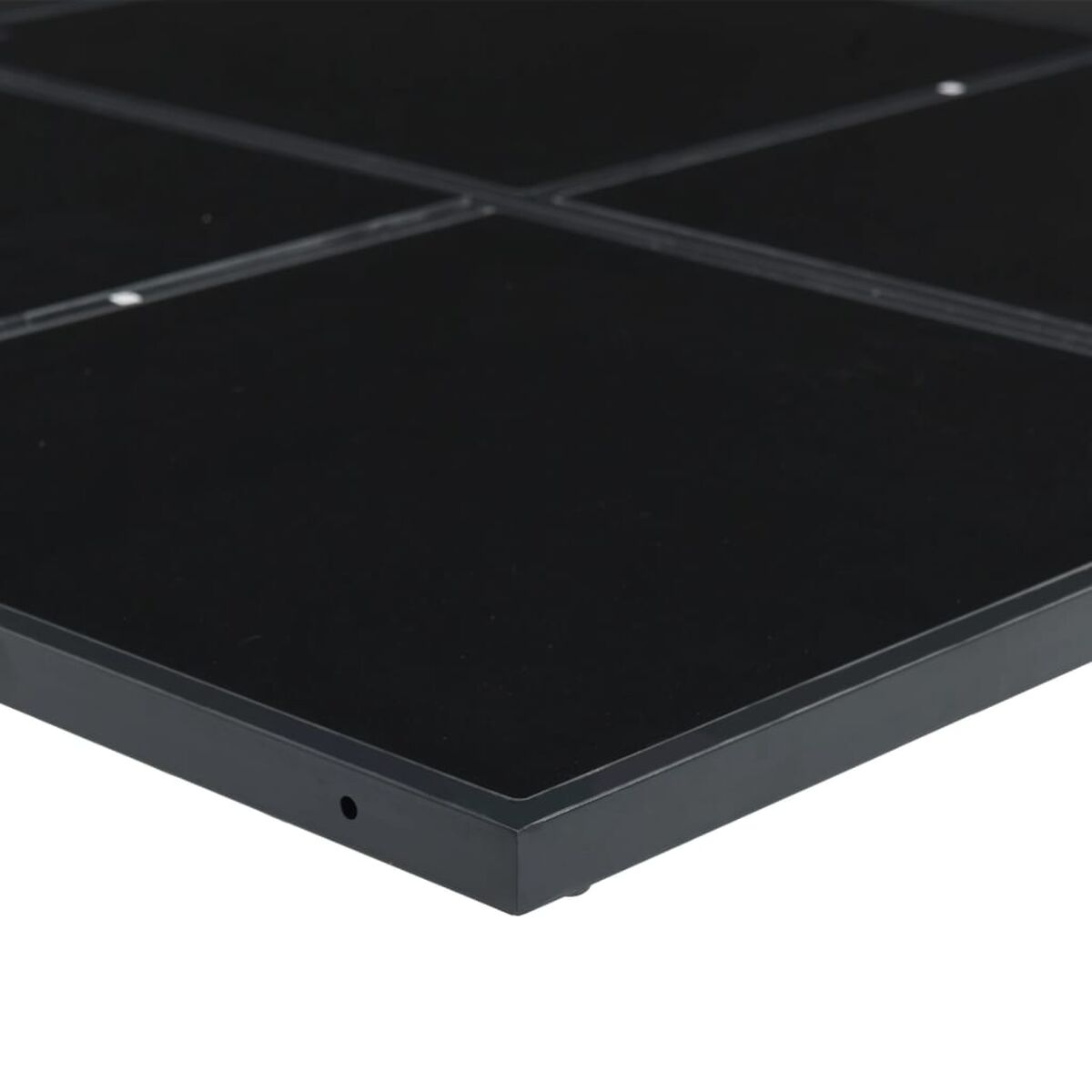 Schwarze quadratische Tischplatte. Die Tischplatte hat einen Rand und scheint aus Glas zu sein.