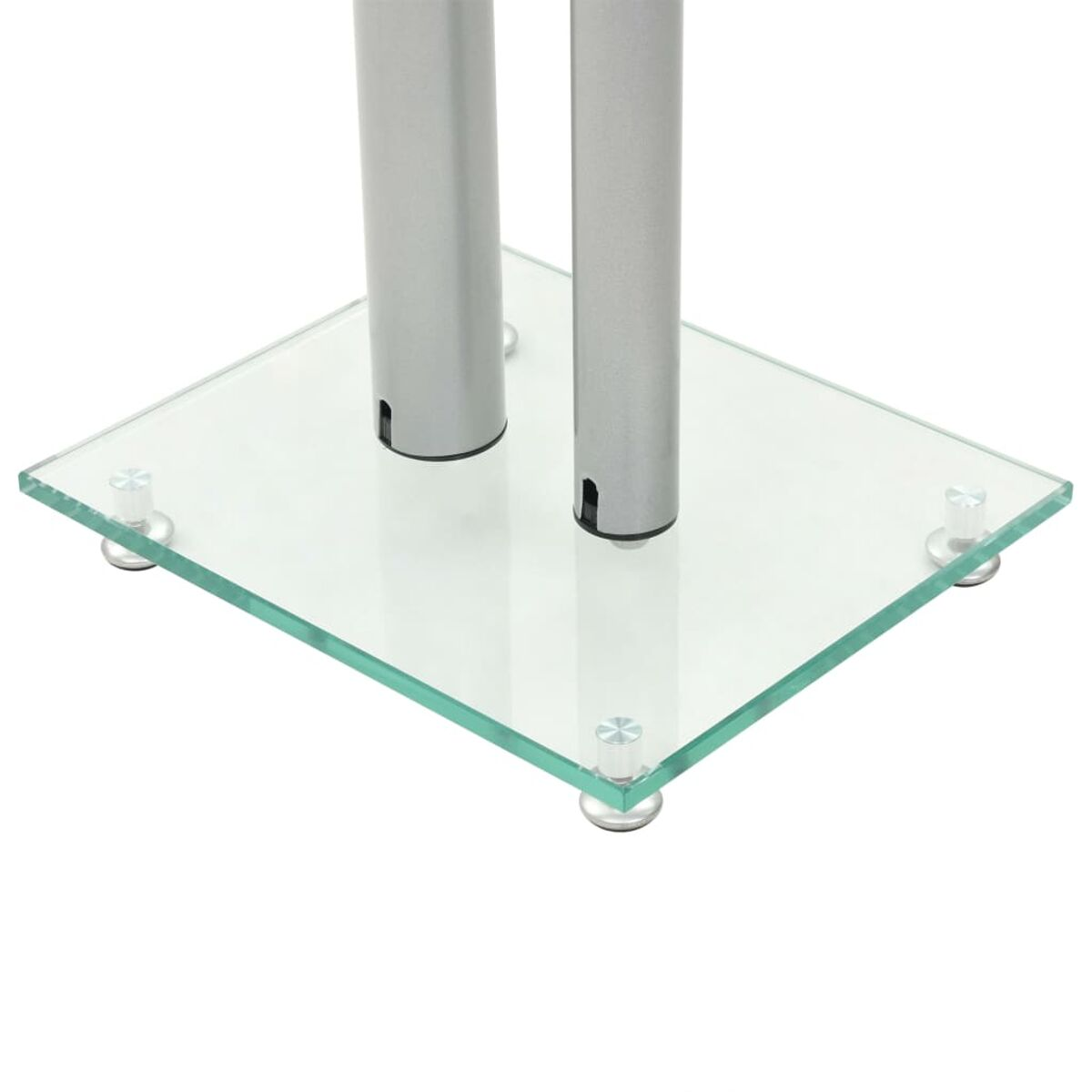 Eine Glasbasis mit zwei silbernen Stangen, getragen von silbernen Beinen, vor weißem Hintergrund.