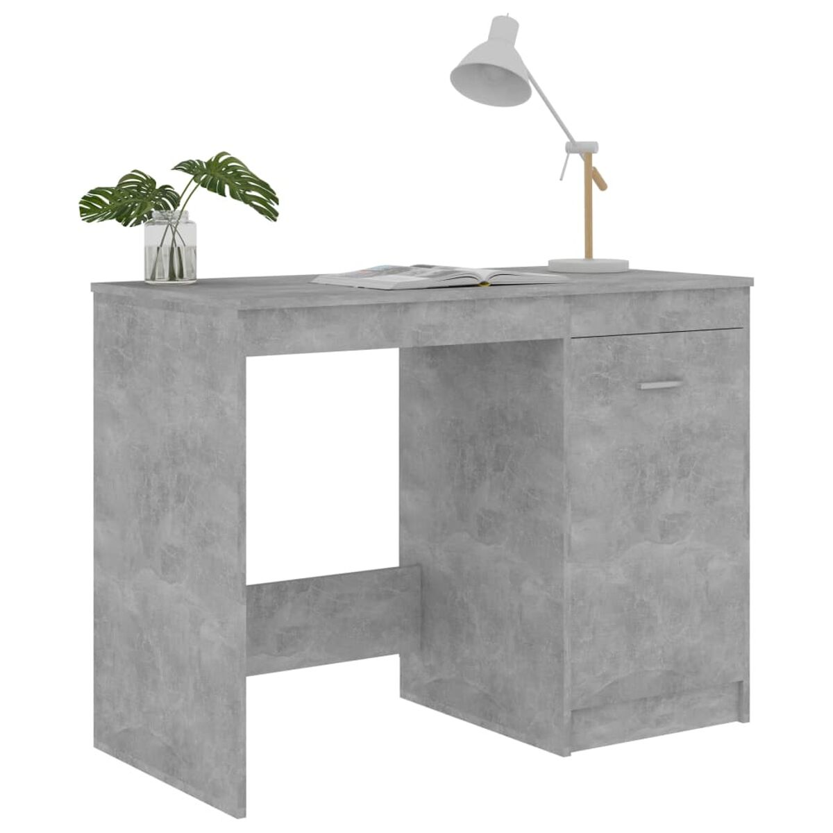 Grauer Schreibtisch mit Schublade, Lampe und Pflanze in Vase.