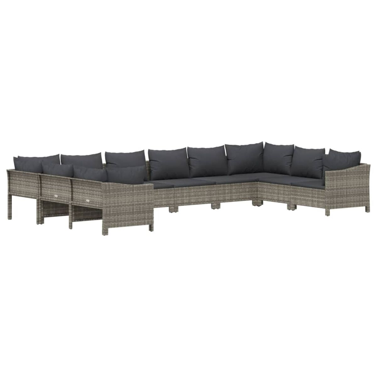 Graues Ecksofa aus Korbgeflecht mit dunkelgrauen Kissen. Es ist in einer gebogenen Formation aufgestellt.