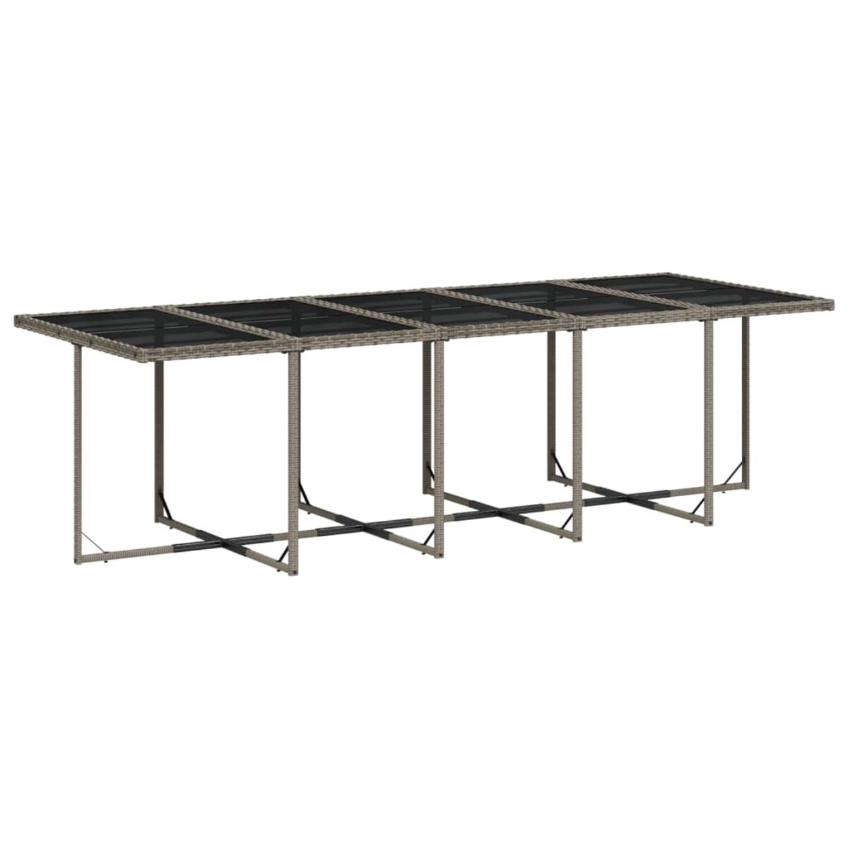 Tavolo rettangolare lungo con piano in vetro e struttura in vimini grigio.