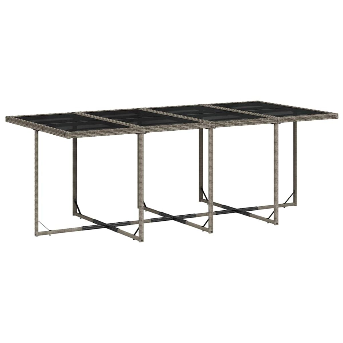 Un lungo tavolo rettangolare in materiale intrecciato, con piano scuro e travi di supporto sottostanti.