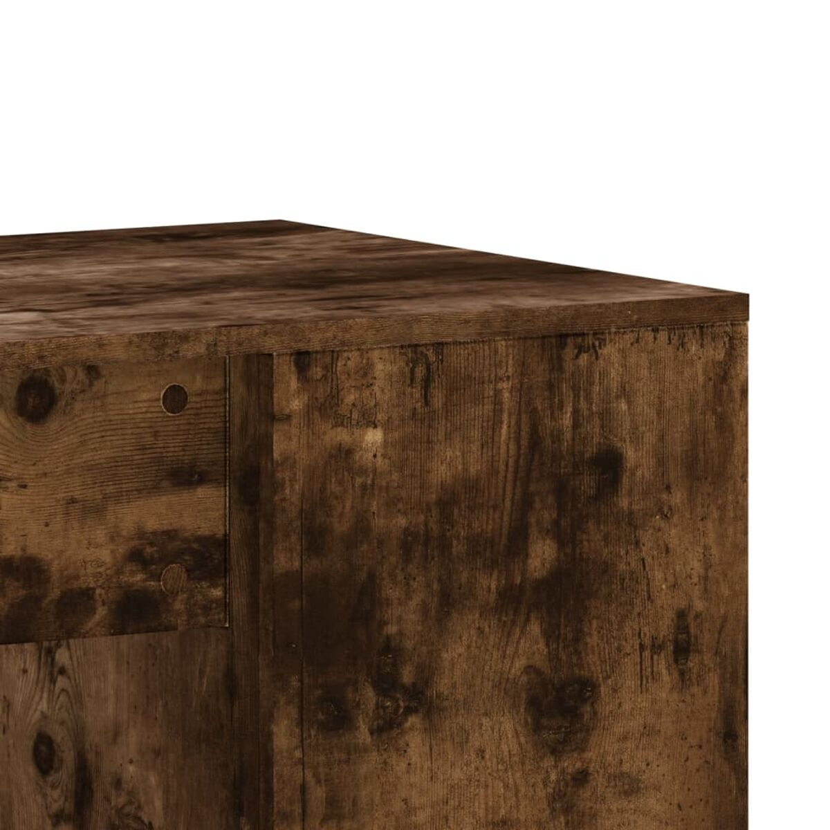 Nahaufnahme einer Holzkastenecke. Das Holz ist dunkelbraun mit sichtbarer Maserung.