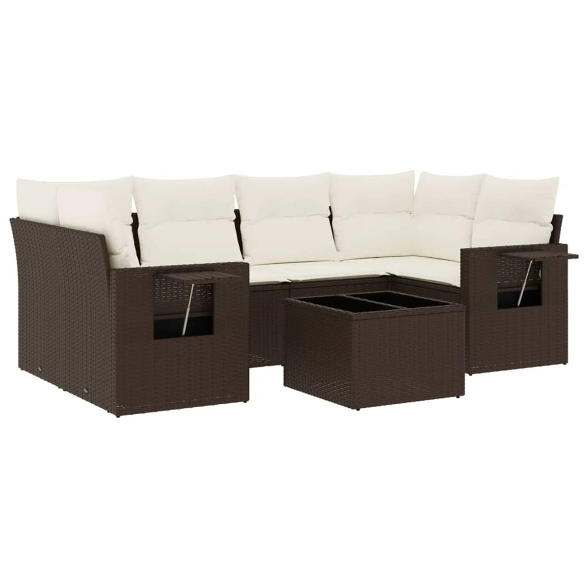 Divano componibile in vimini marrone scuro con cuscini color crema e tavolino.