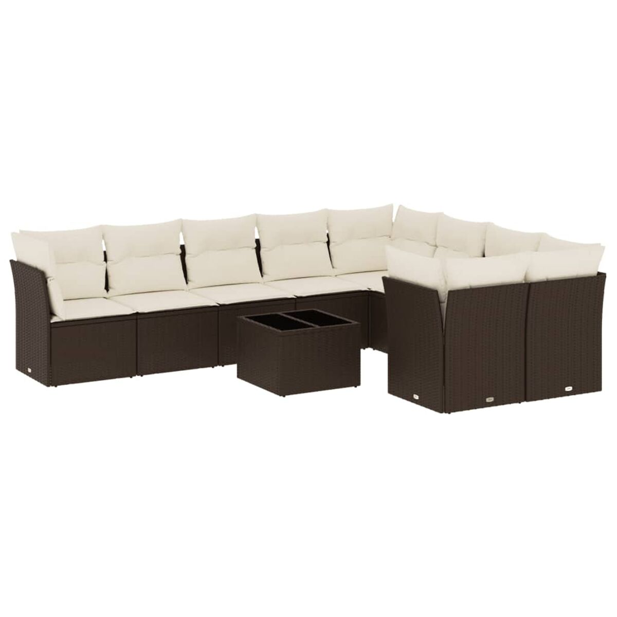 Divano componibile in vimini marrone scuro con cuscini bianco sporco e tavolino coordinato.