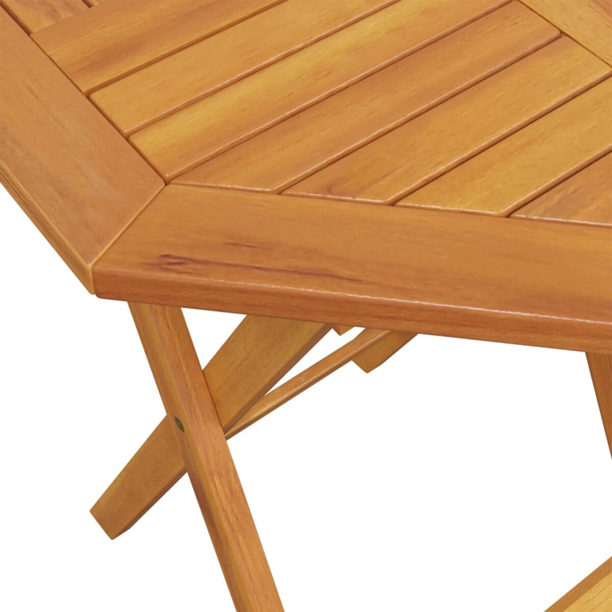 Nahaufnahme einer Holztischecke mit Maserung.