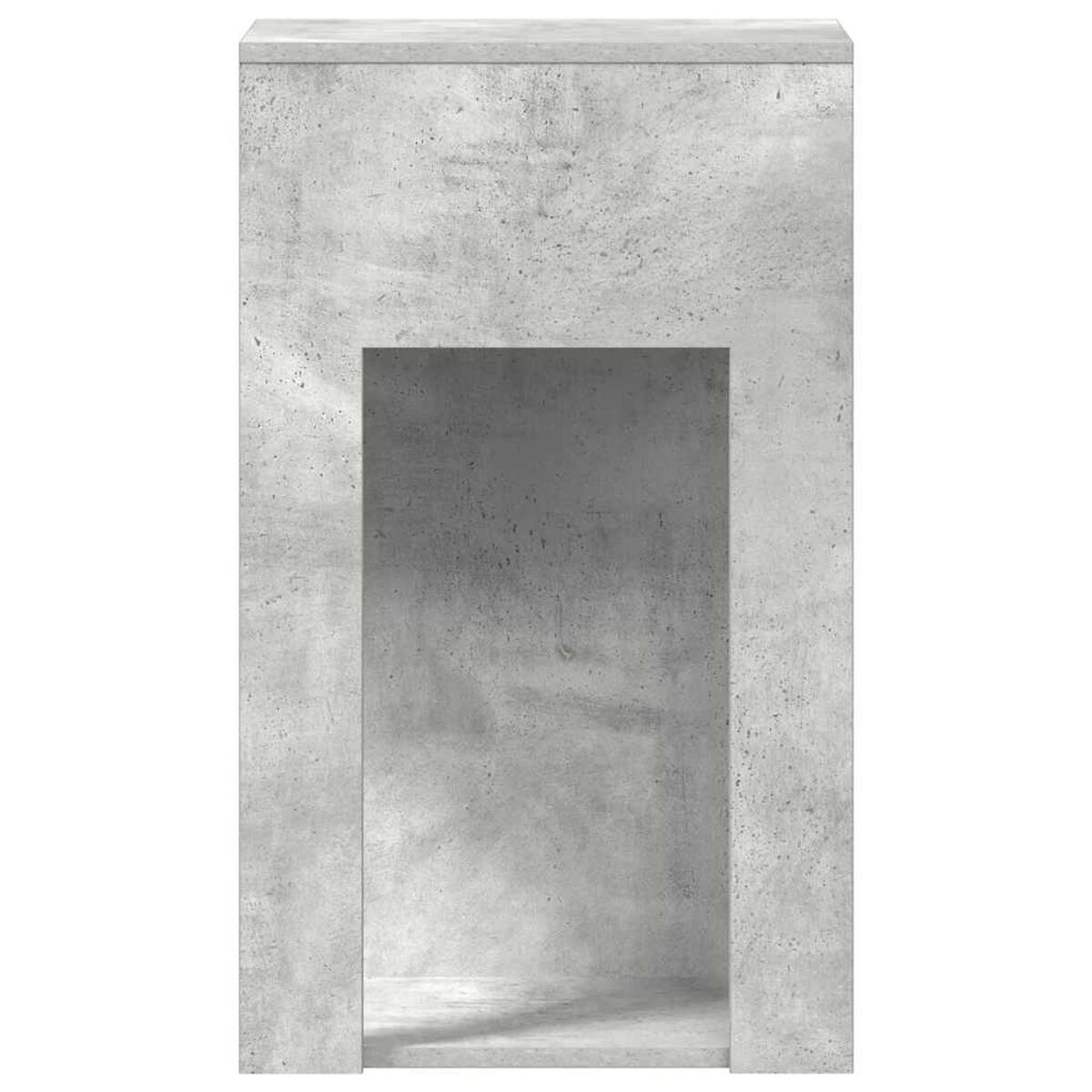 Ein grauer Beton-Kamin mit rechteckiger Öffnung.