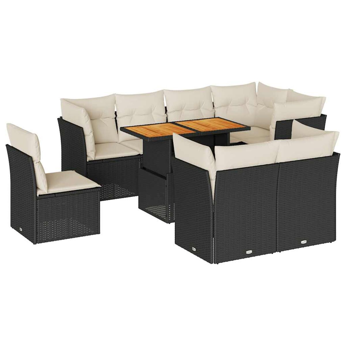 Divano componibile in vimini nero con cuscini color crema e tavolo in legno.