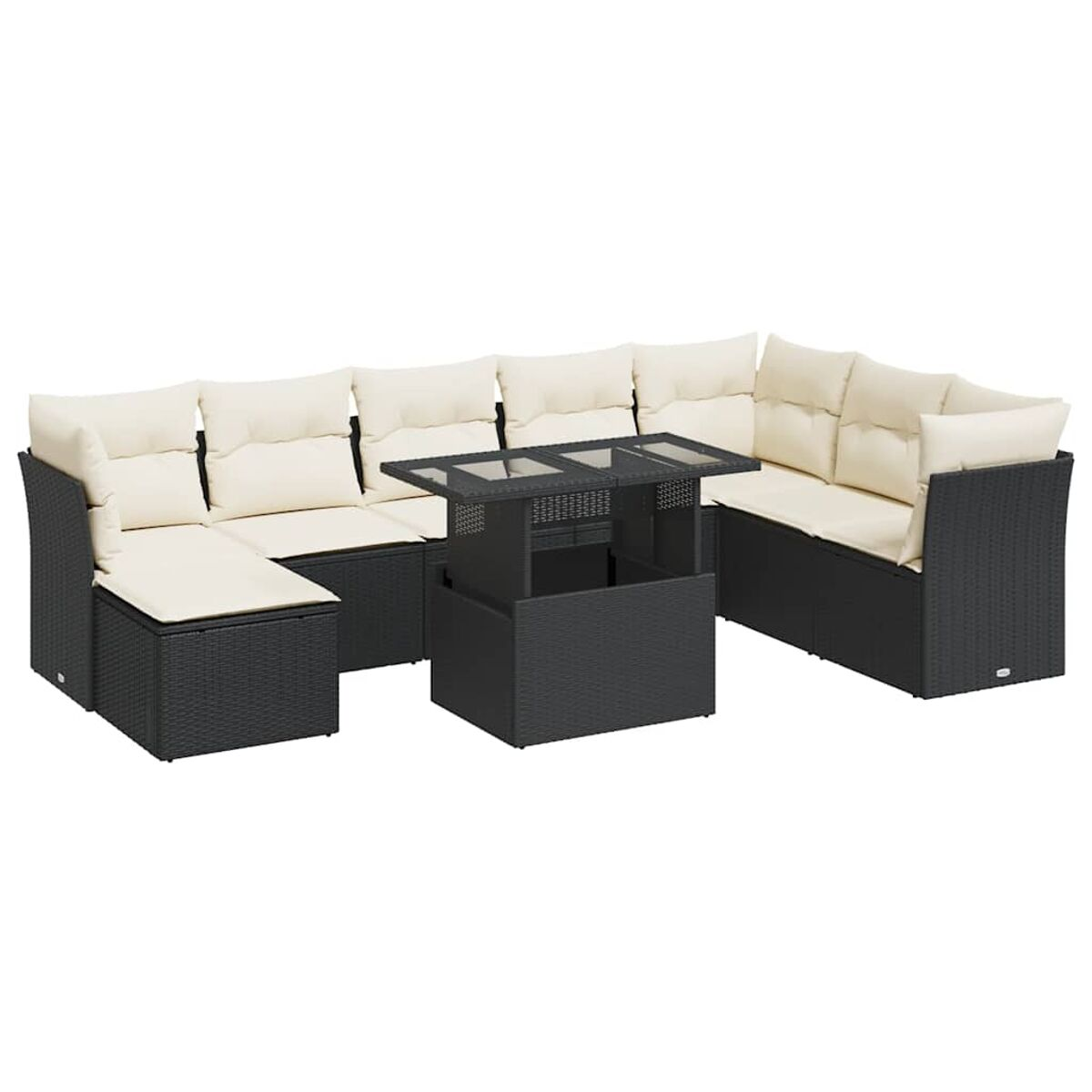 Divano angolare in vimini nero con cuscini color crema e tavolo con piano in vetro.