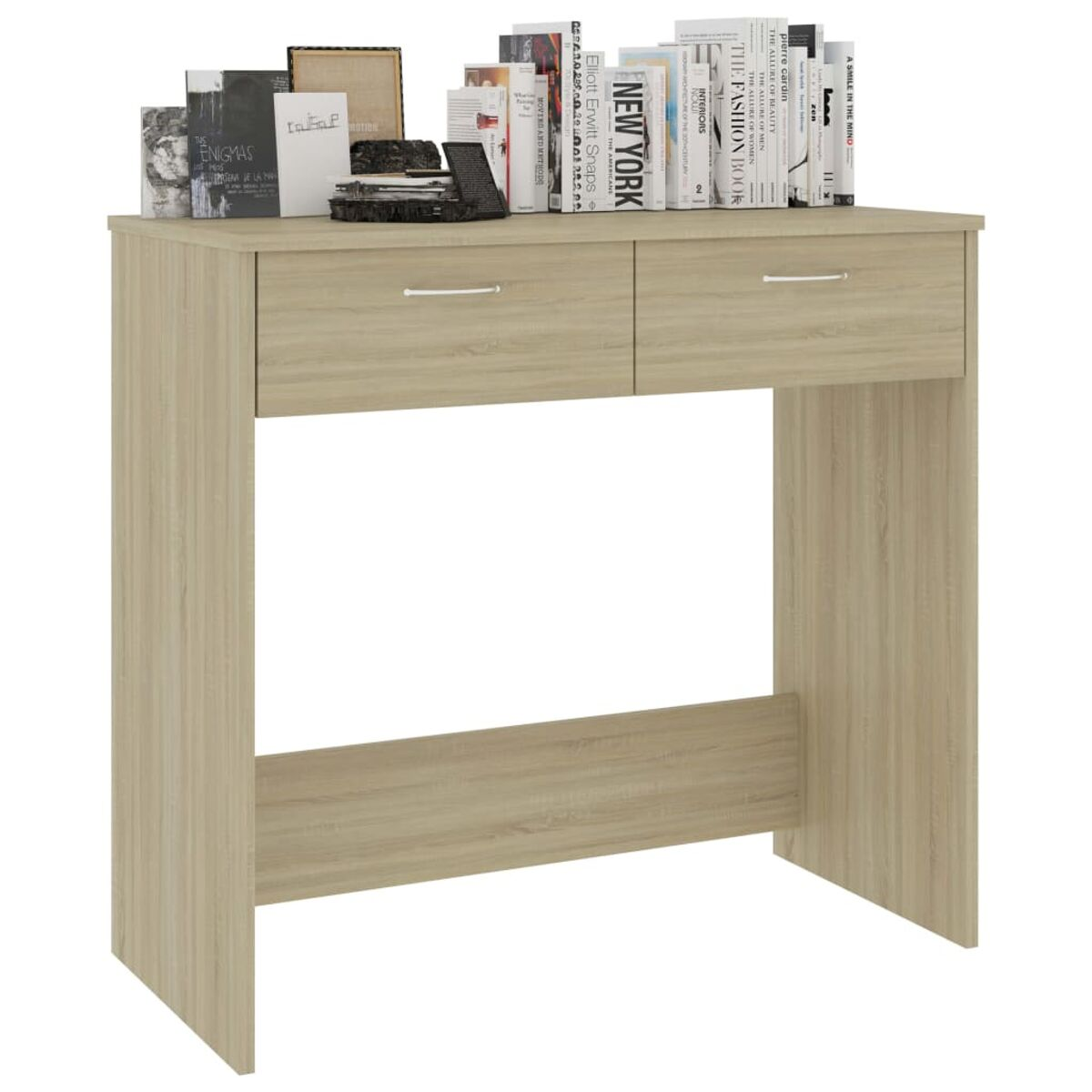 Ein helles Holzschreibtisch mit zwei Schubladen, obenauf Bücher.