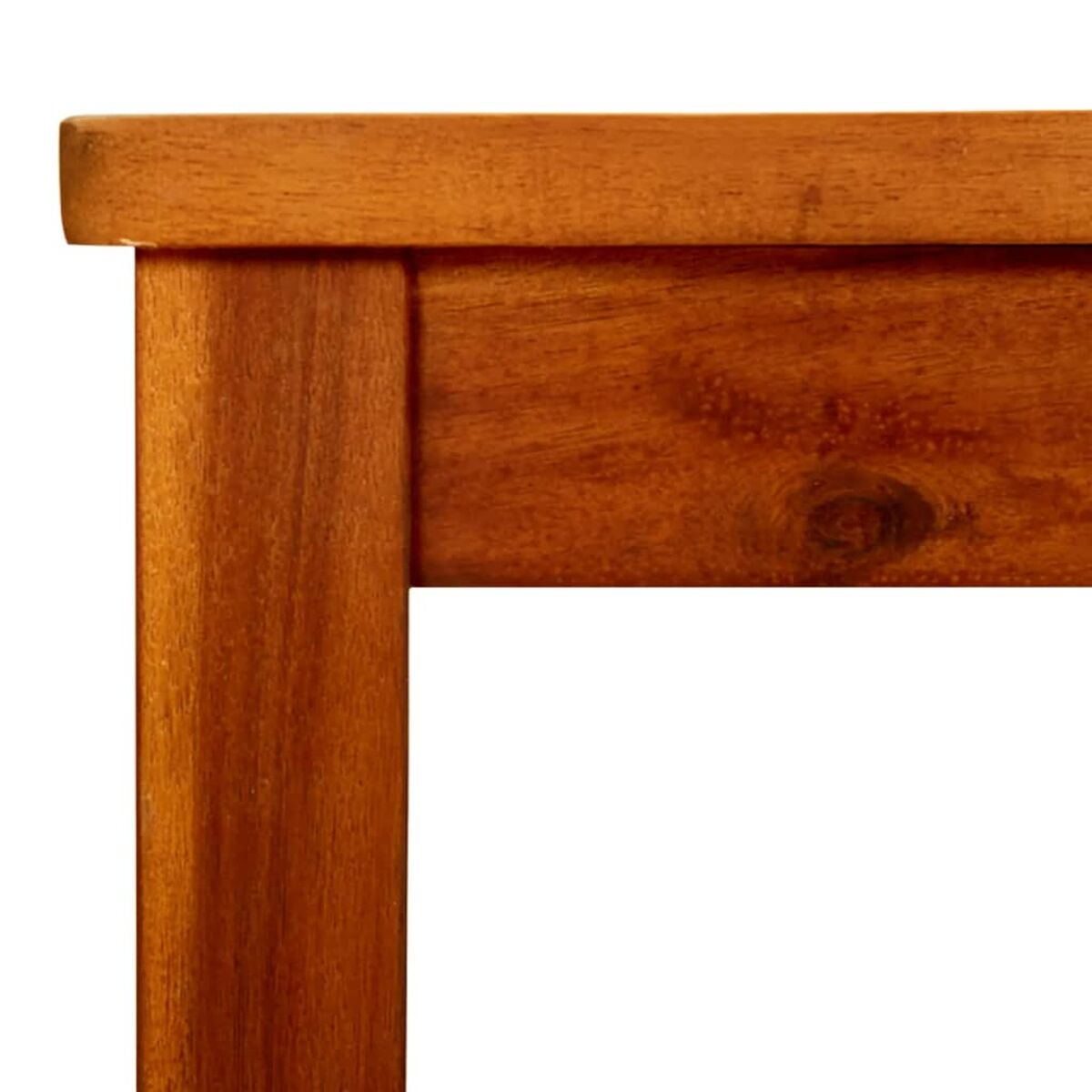 Nahaufnahme einer Holztischecke, zeigt Maserung und Konstruktion.