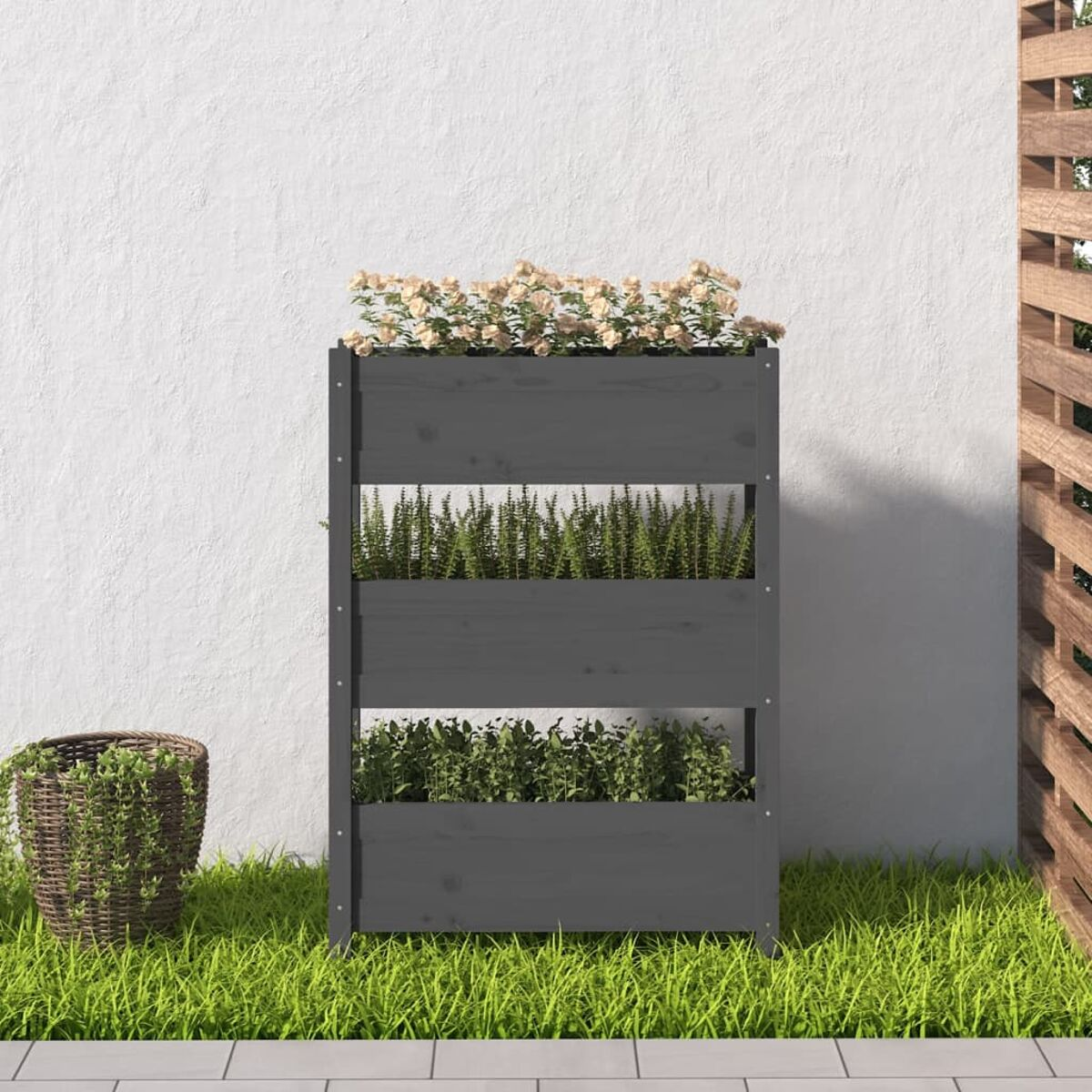 Dunkelgrauer Pflanzkasten. Die Box hat drei Ebenen und ist mit Pflanzen und Blumen gefüllt.