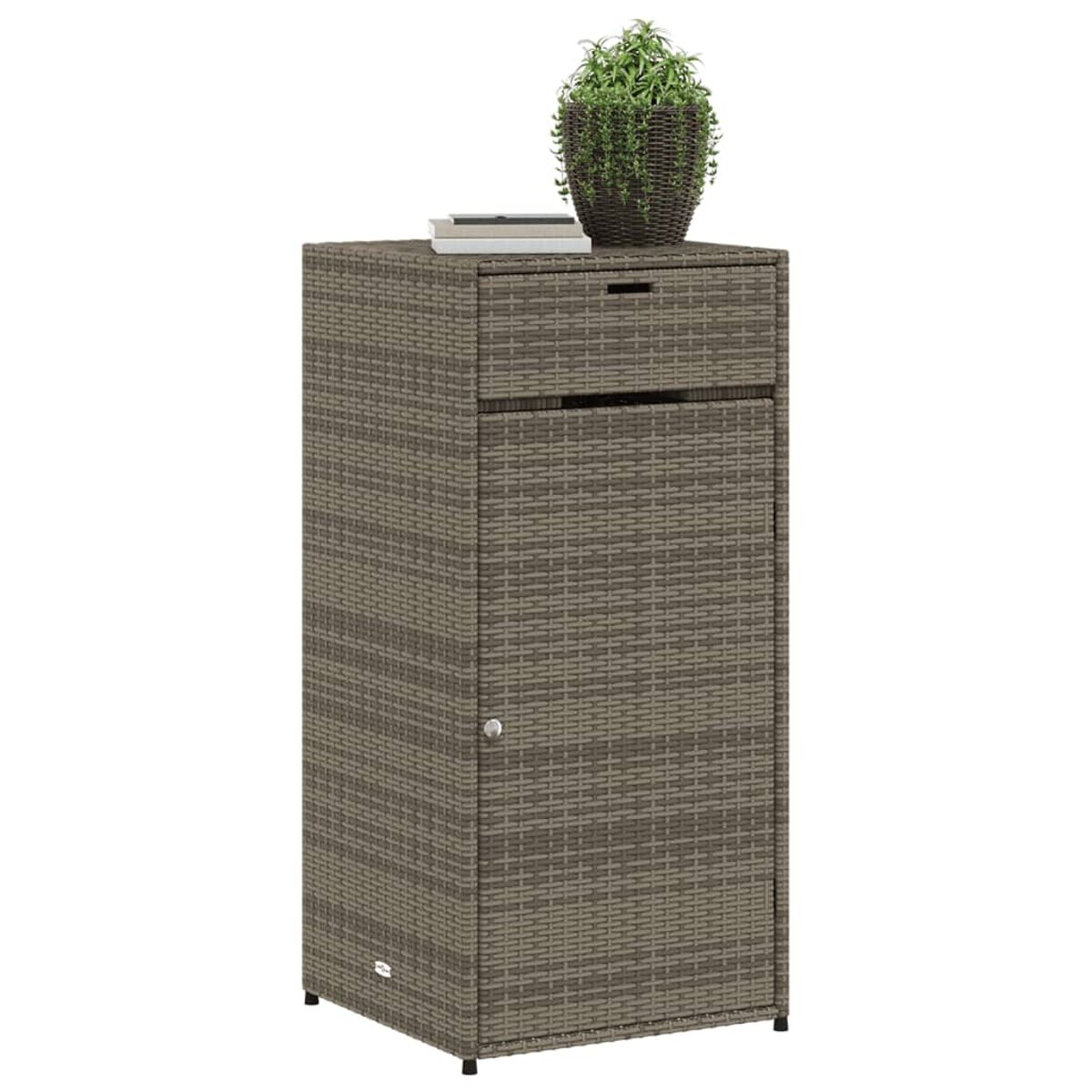 Ein brauner Korbgeflechtschrank mit Schublade, Tür und einer Pflanze obenauf.