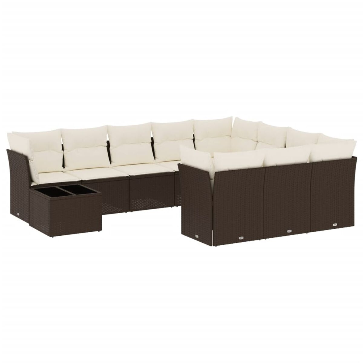 Divano componibile in vimini marrone scuro con cuscini color crema. Ha un vano contenitore.