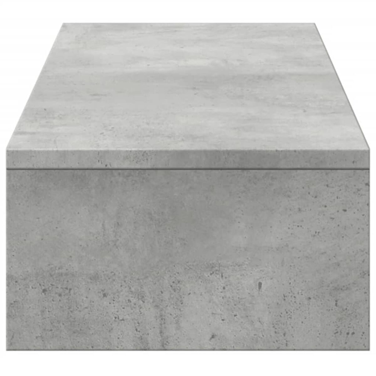 Graue Betonbox, wahrscheinlich ein Dekorationselement oder ein niedriger Tisch.