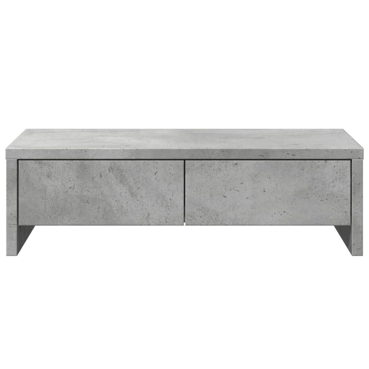 Grauer Couchtisch aus Beton mit zwei Schubladen.