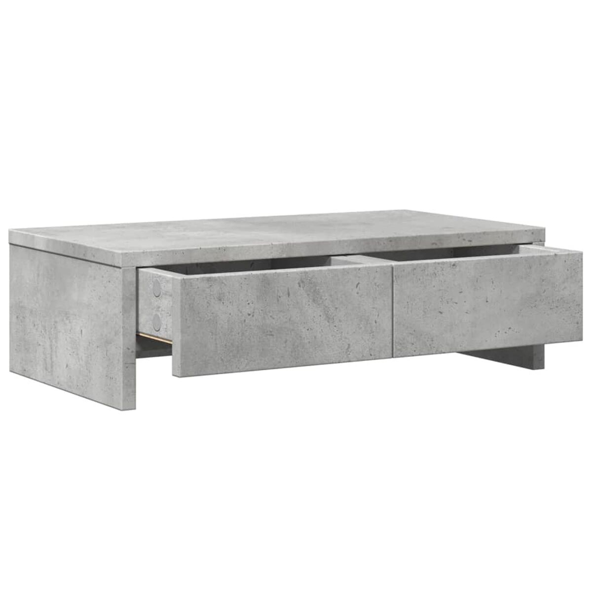 Grauer Couchtisch aus Beton mit zwei offenen Schubladen. Der Tisch ist rechteckig.