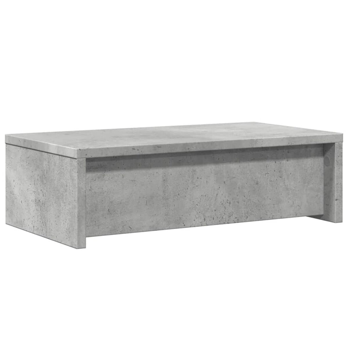 Grauer rechteckiger Couchtisch. Der Tisch besteht aus betonähnlichem Material.