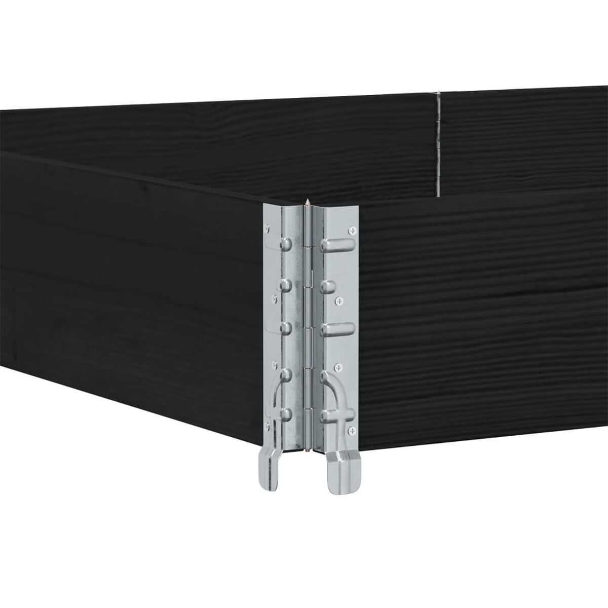 Un primo piano di una scatola di legno nera con cerniere metalliche.
