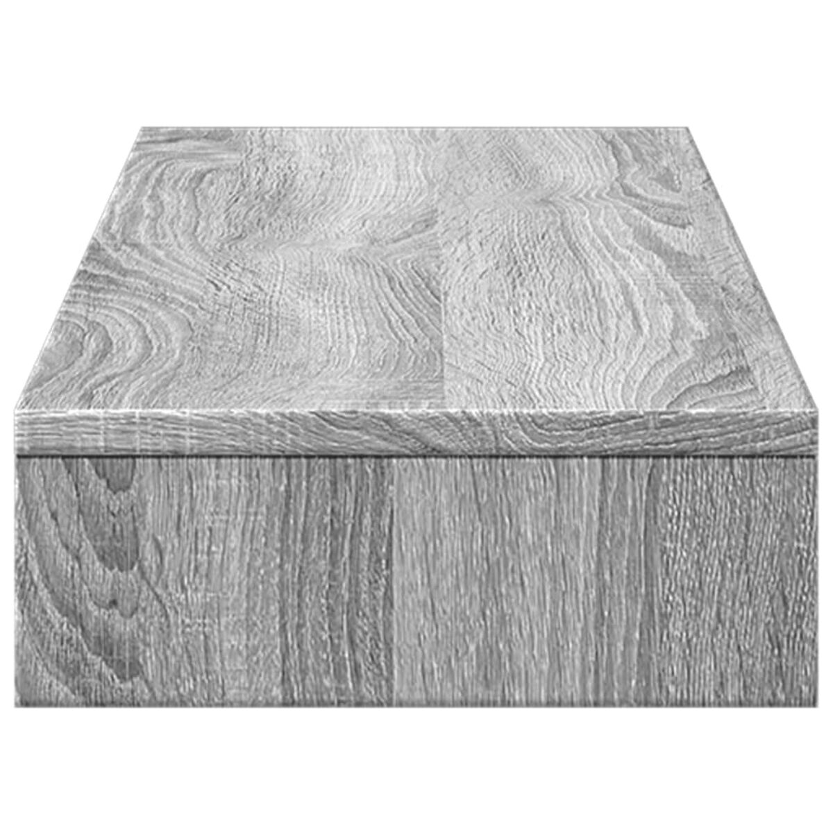 Eine Holzkiste mit einem grauen Holzmaserungsmuster. Die Kiste hat eine einfache, rechteckige Form.