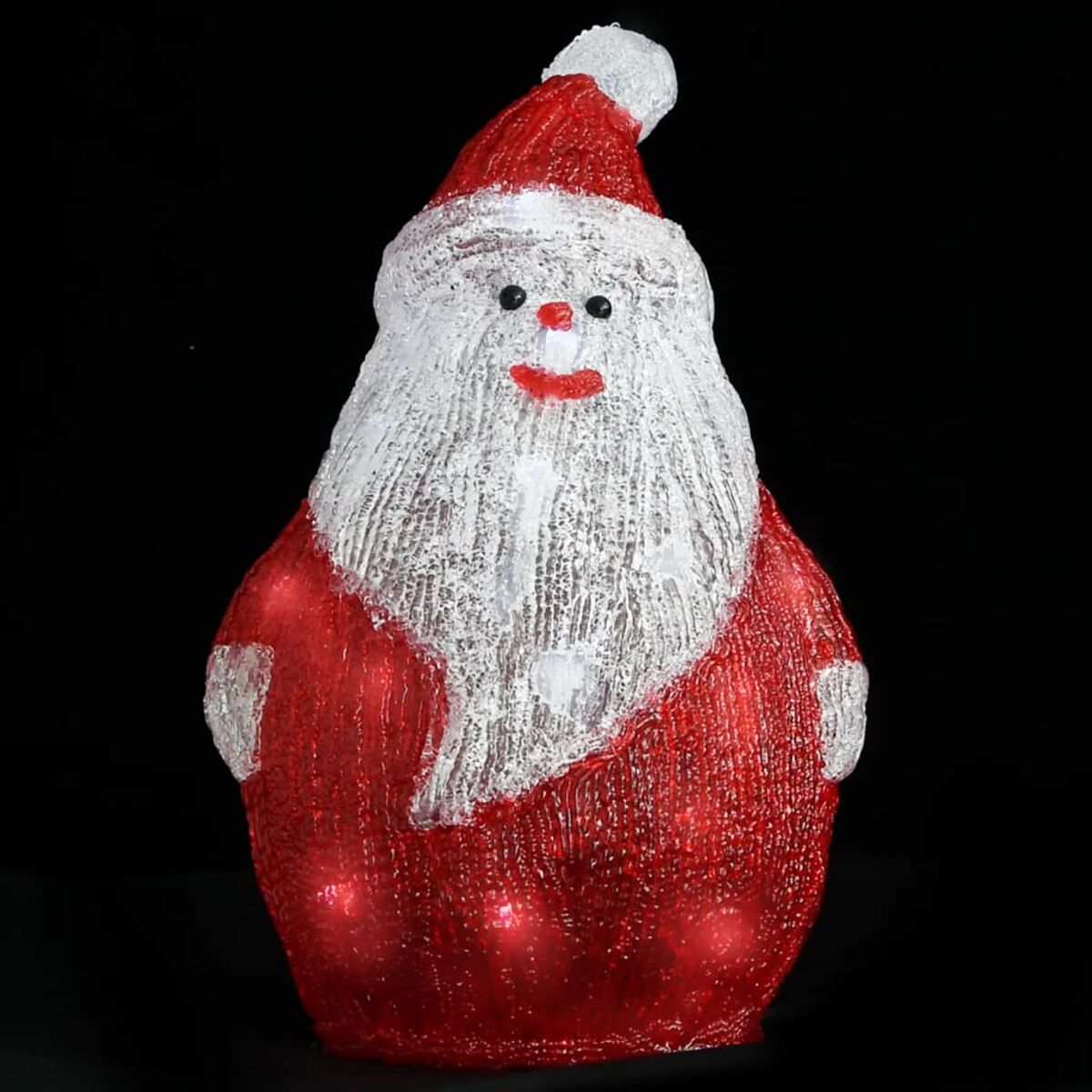 Eine Weihnachtsmann-Dekoration, roter Mantel und Hut, weißer Bart, mit schwarzem Hintergrund.