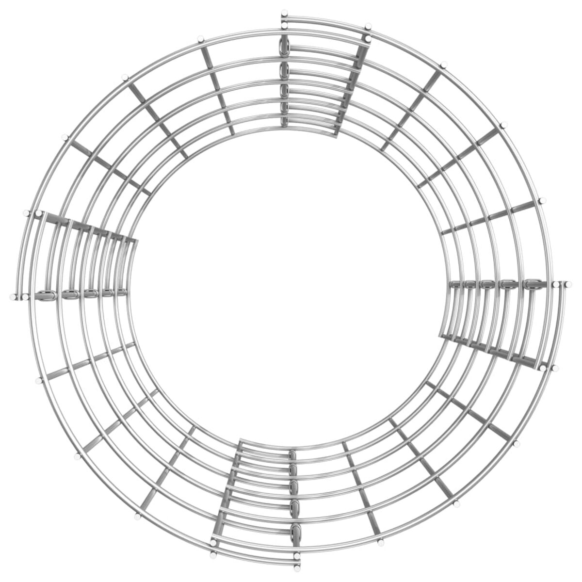 Draufsicht auf eine kreisförmige Metallstruktur, konzentrische Bögen.