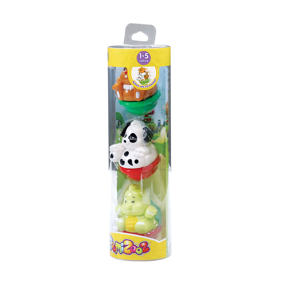Ein Spielzeugset mit drei Tierfiguren: einem braunen Hund, einem Dalmatiner und einem grünen Frosch.