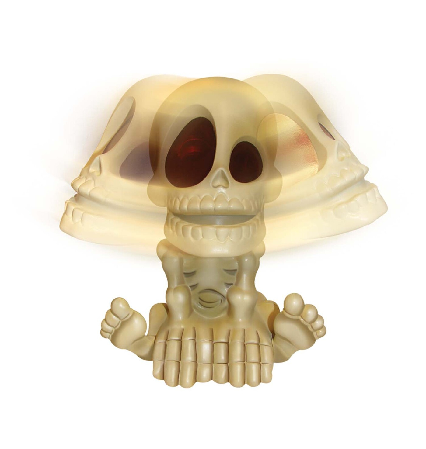 Skeletro giocattolo con teschio, mani in su e piedi, su sfondo bianco.