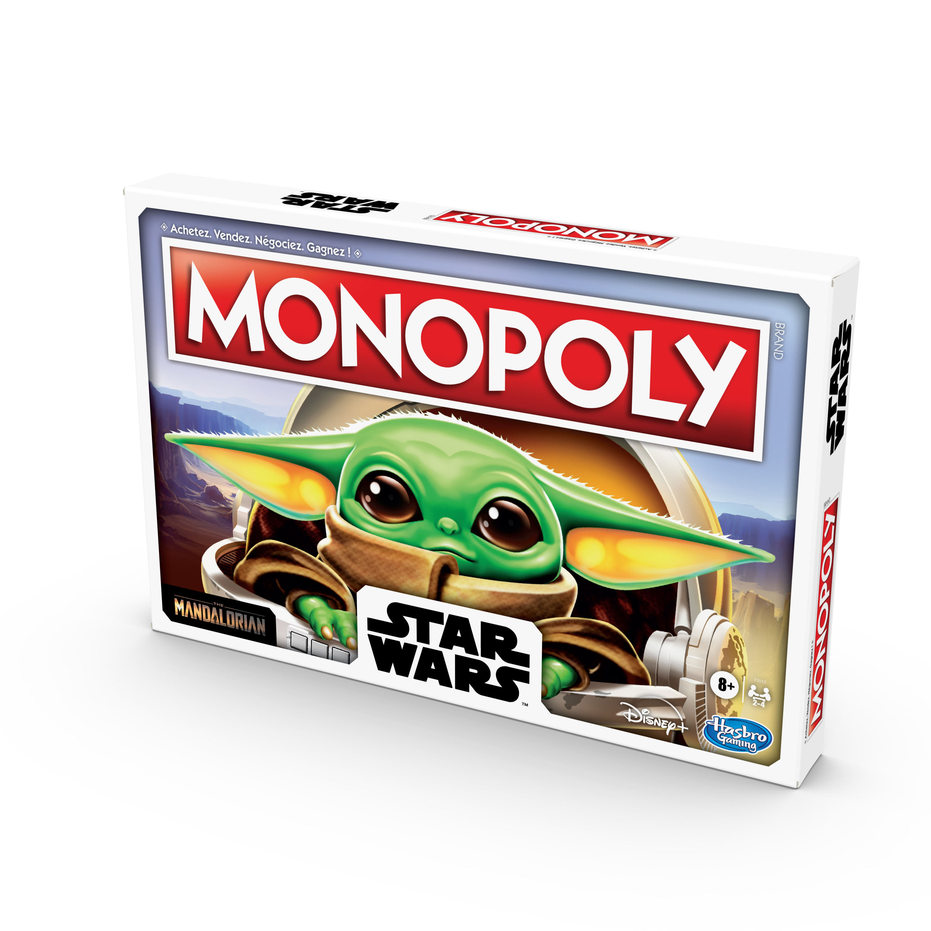 Pudełko Monopoly Star Wars. Przedstawia Grogu w statku z tłem planety. Pudełko jest białe z czerwonym tekstem.