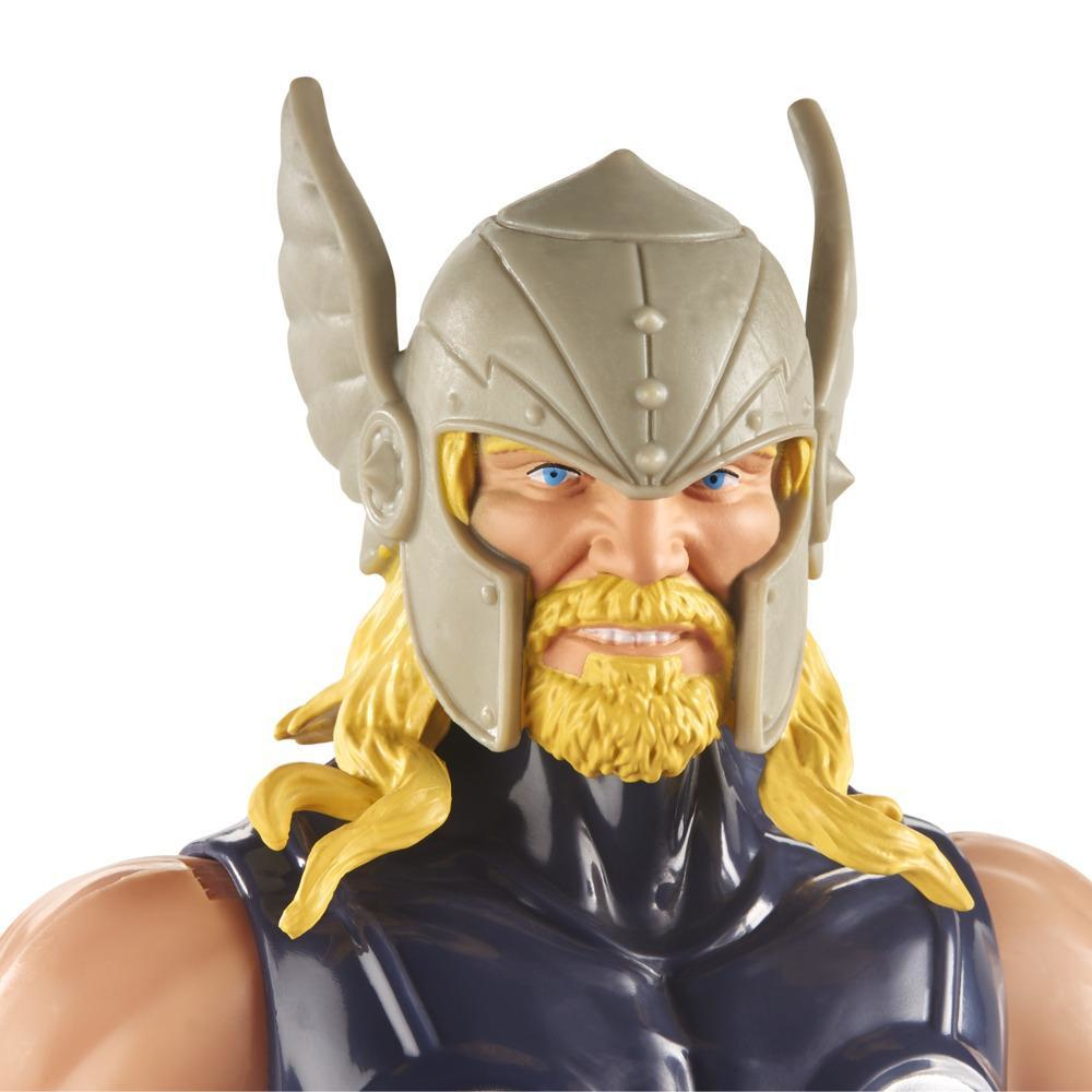 Testa della action figure di Thor. Elmo grigio con ali, capelli biondi e occhi blu.
