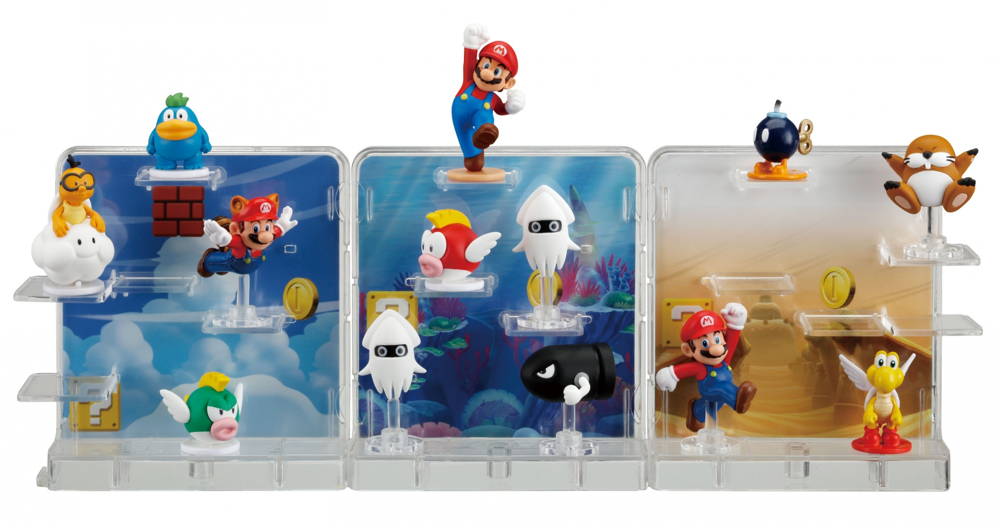 Figurki Mario w przezroczystych plastikowych etui z tematycznym tłem.