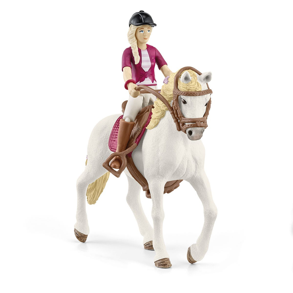 Cavallo giocattolo con cavaliere con giacca rossa e casco nero.