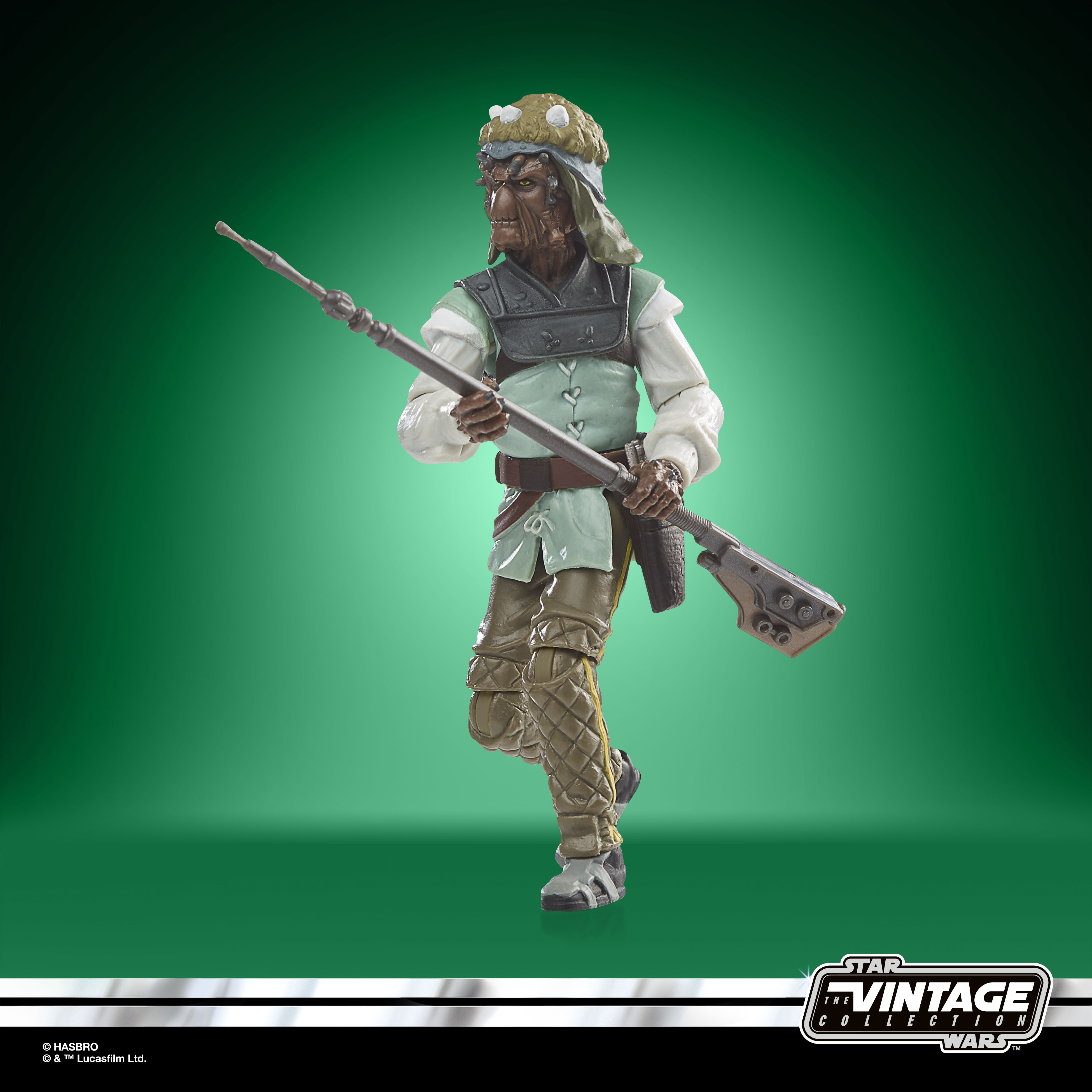 Star Wars Actionfigur einer Figur mit Gewehr, auf grünem Hintergrund.